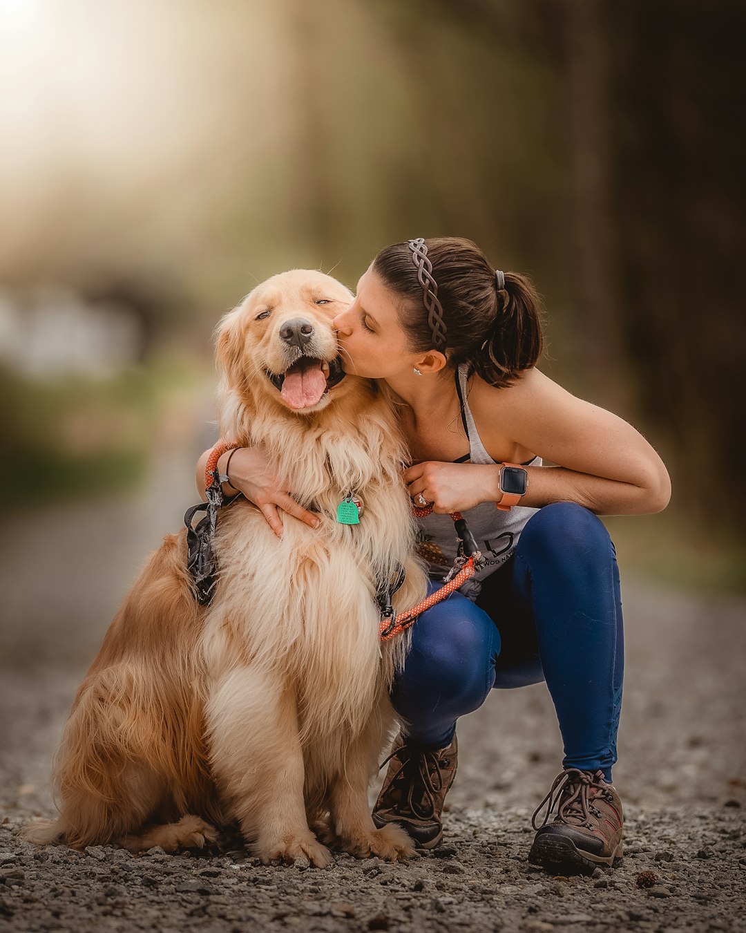 gallery-02 This is my beautiful wife kissing our Golden retriever Oakley. As you can see, this little boy is so happy in this moment.